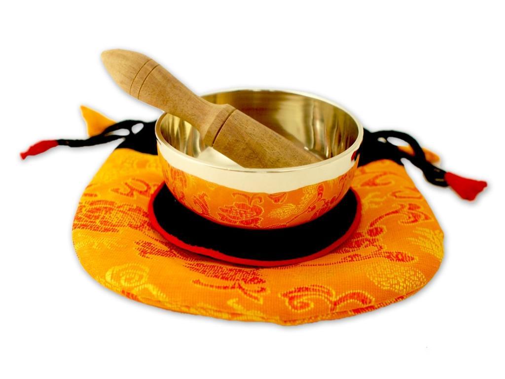 Beispielinhalt (Bild) Kleine Klangschale mit hellem Klang in gelbem Beutel