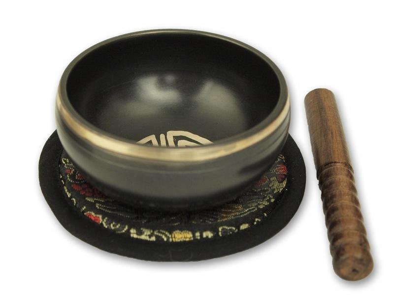 Beispielinhalt (Bild) Kleine schwarze Klangschalen in schwarzer, runder Box mit Longevity-Aufdruck