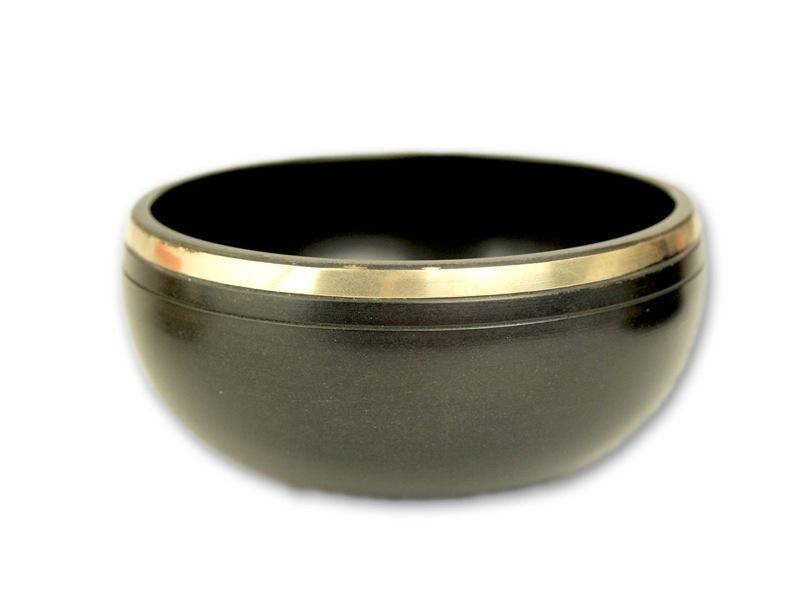 Beispielinhalt (Bild) Kleine schwarze Klangschalen in schwarzer, runder Box mit Longevity-Aufdruck