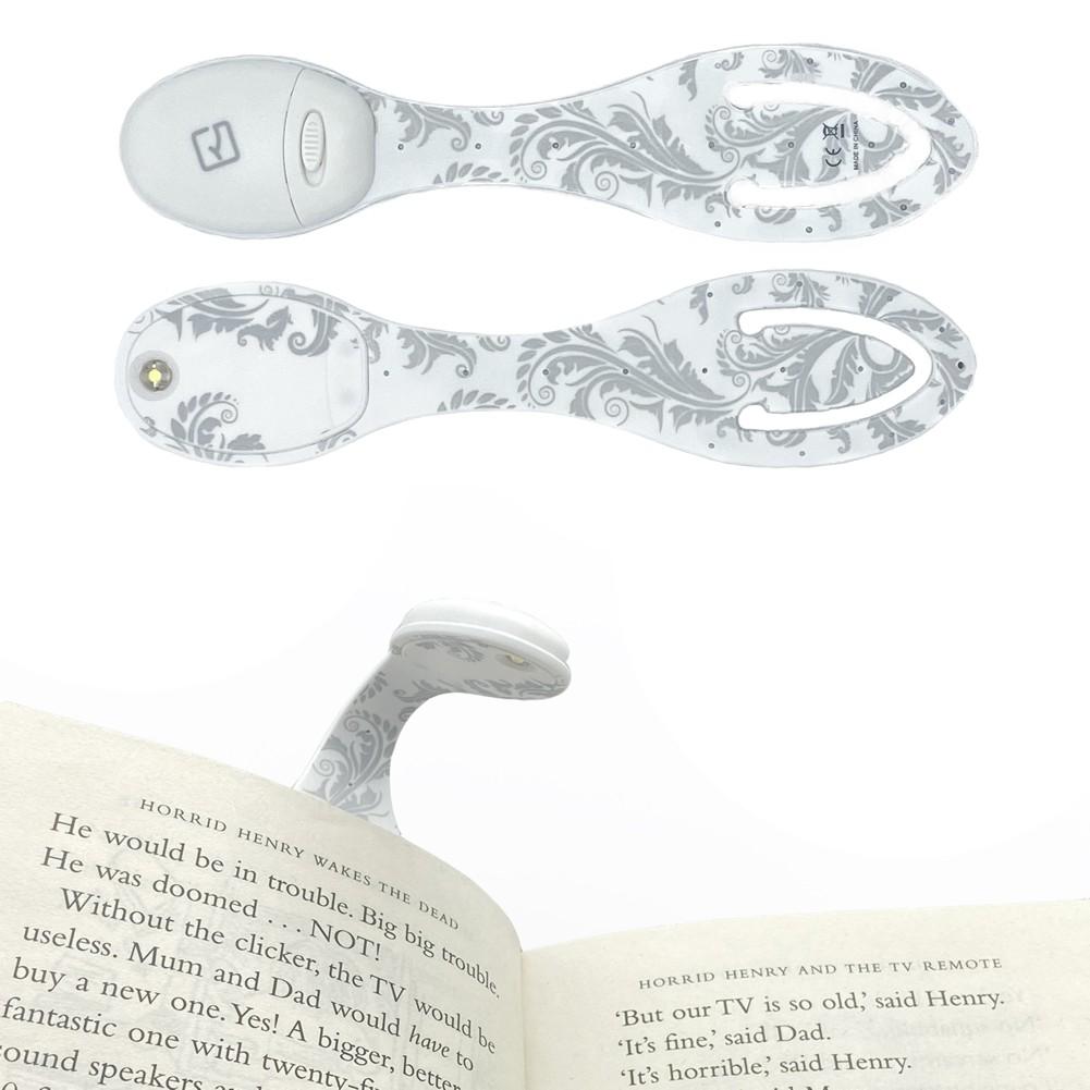 Beispielinhalt (Bild) Flexilight Leselicht (White Flowers) | weiß | 2 in 1 Leselampe & Lesezeichen | LED Leselicht | Geschenk für Leser, Buchliebhaber | Deutsche Ausgabe