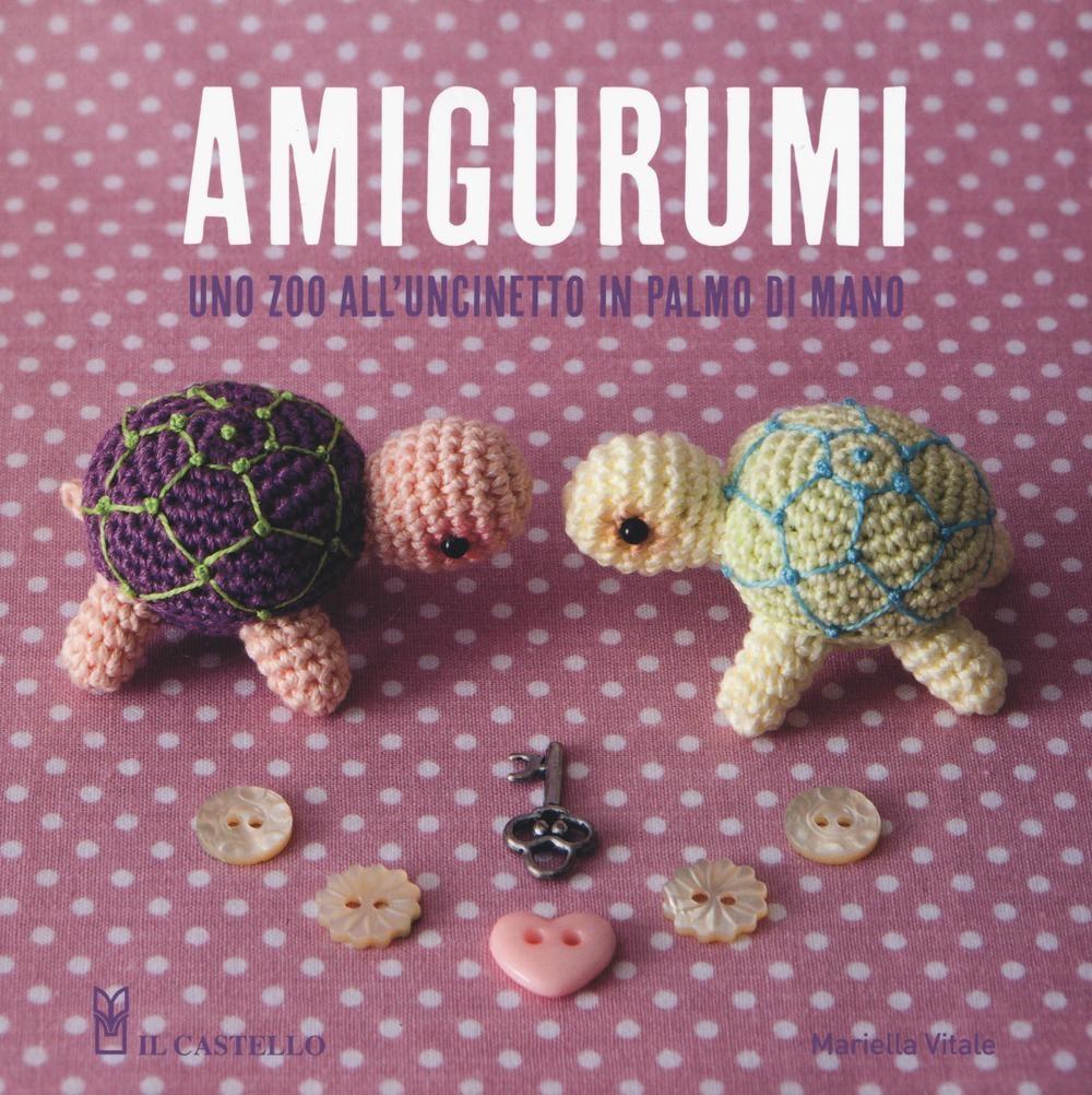 Vorderes Coverbild Amigurumi. Uno zoo all'uncinetto in palmo di mano