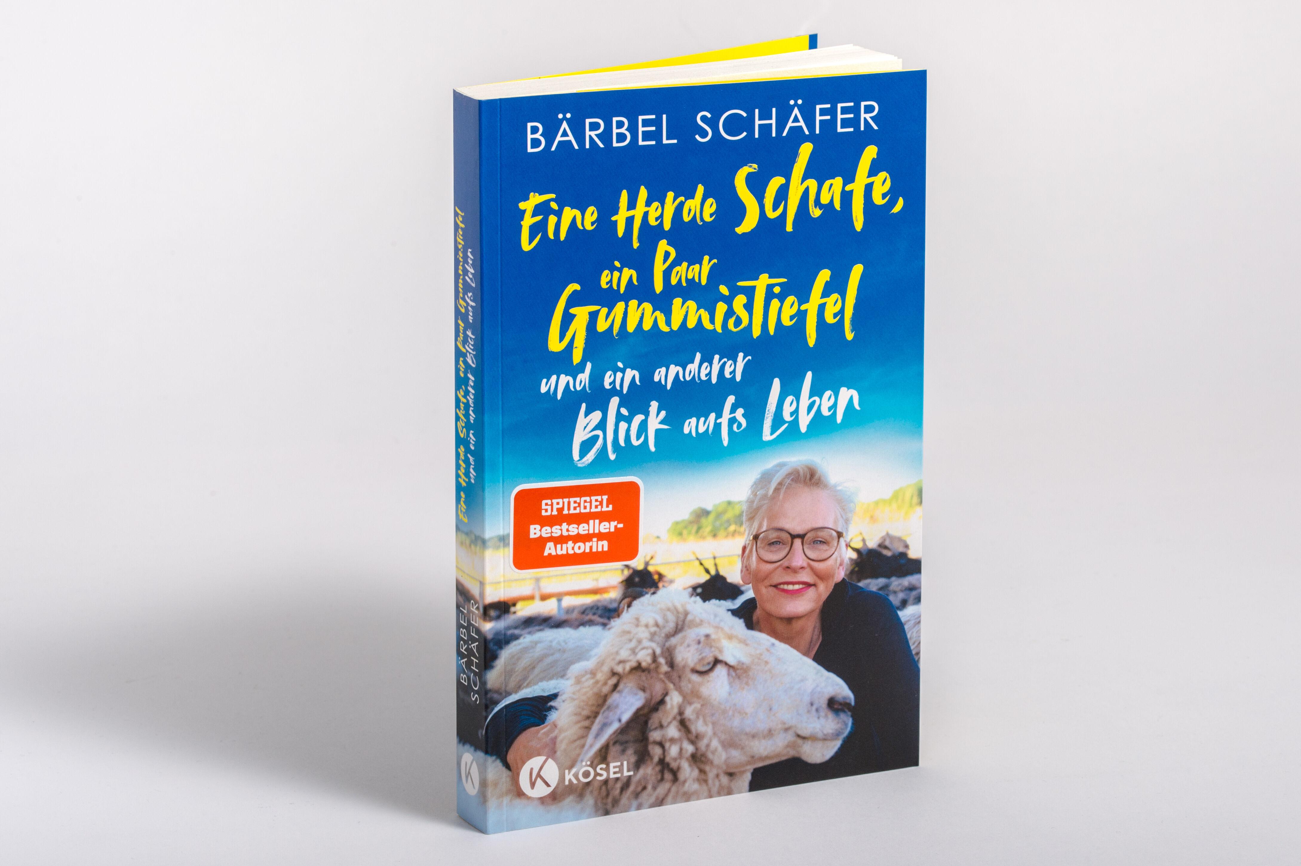 Beispielinhalt (Bild) Eine Herde Schafe, ein Paar Gummistiefel und ein anderer Blick aufs Leben
