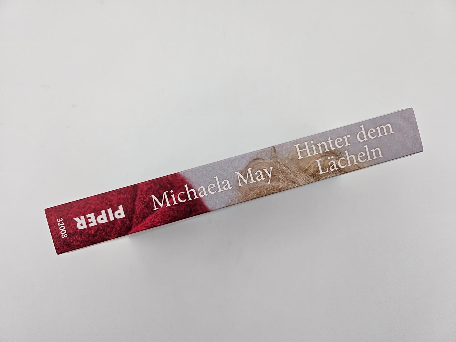 Beispielinhalt (Bild) Hinter dem Lächeln