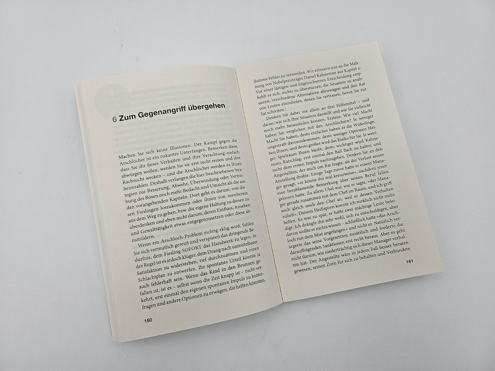 Beispielinhalt (Bild) Überleben unter Arschlöchern