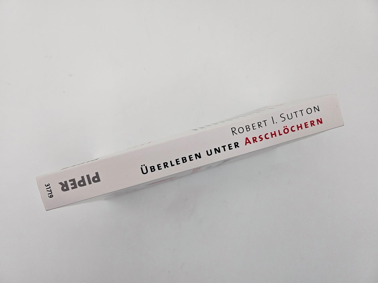 Beispielinhalt (Bild) Überleben unter Arschlöchern