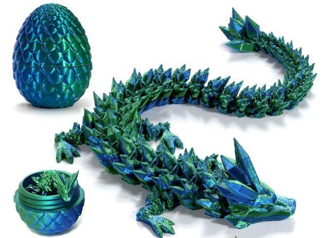 Beispielinhalt (Bild) Drachenei "MagiX Dragon Egg RYKTOR", blau, Drachen 22,5 cm & Ei 8 cm