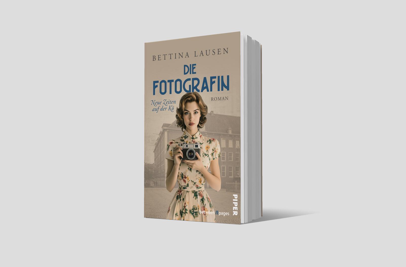 Beispielinhalt (Bild) Neue Zeiten auf der Kö - Die Fotografin