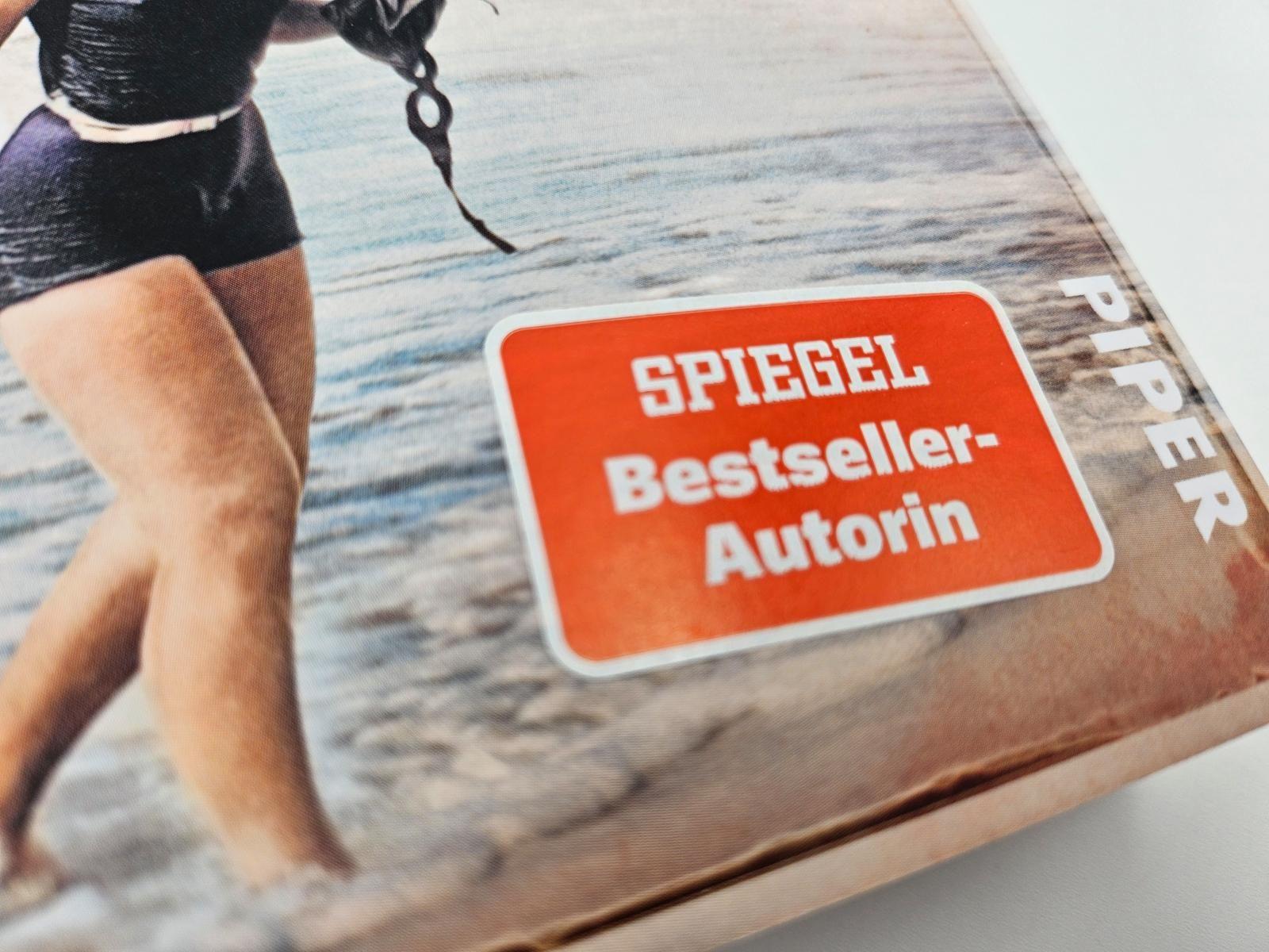 Beispielinhalt (Bild) Heldin der Gezeiten - Eine Schwimmerin. Ein Ziel. Ein weltweiter Erfolg.